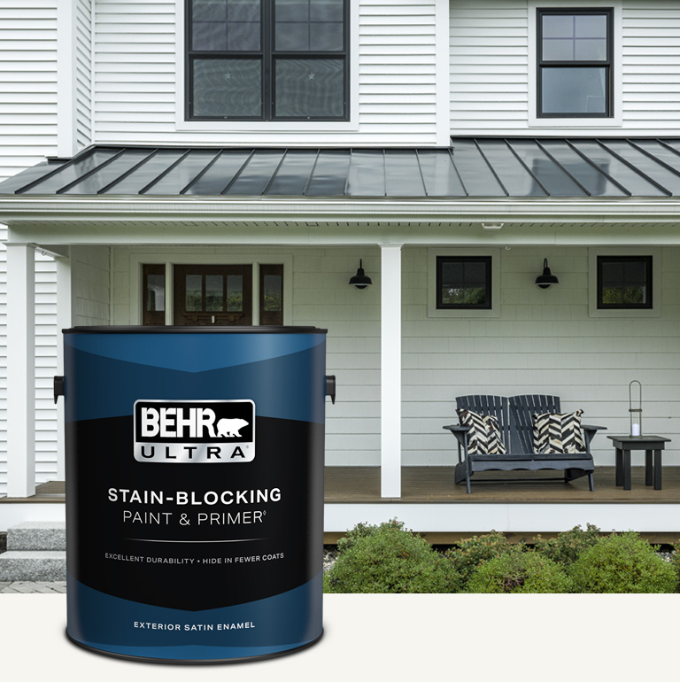 White house exterior with a can of Behr Ultra Exterior Satin Enamel in foreground Mobile